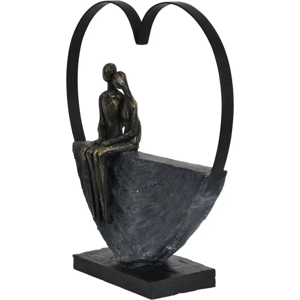 Couple Inside Heart Sculpture
