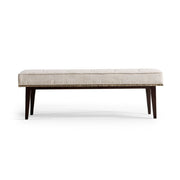 Jonathan Charles geometric upholstered bench in light beige Arlan Moon fabric with six tufted panels and dark stained tapered wood legs