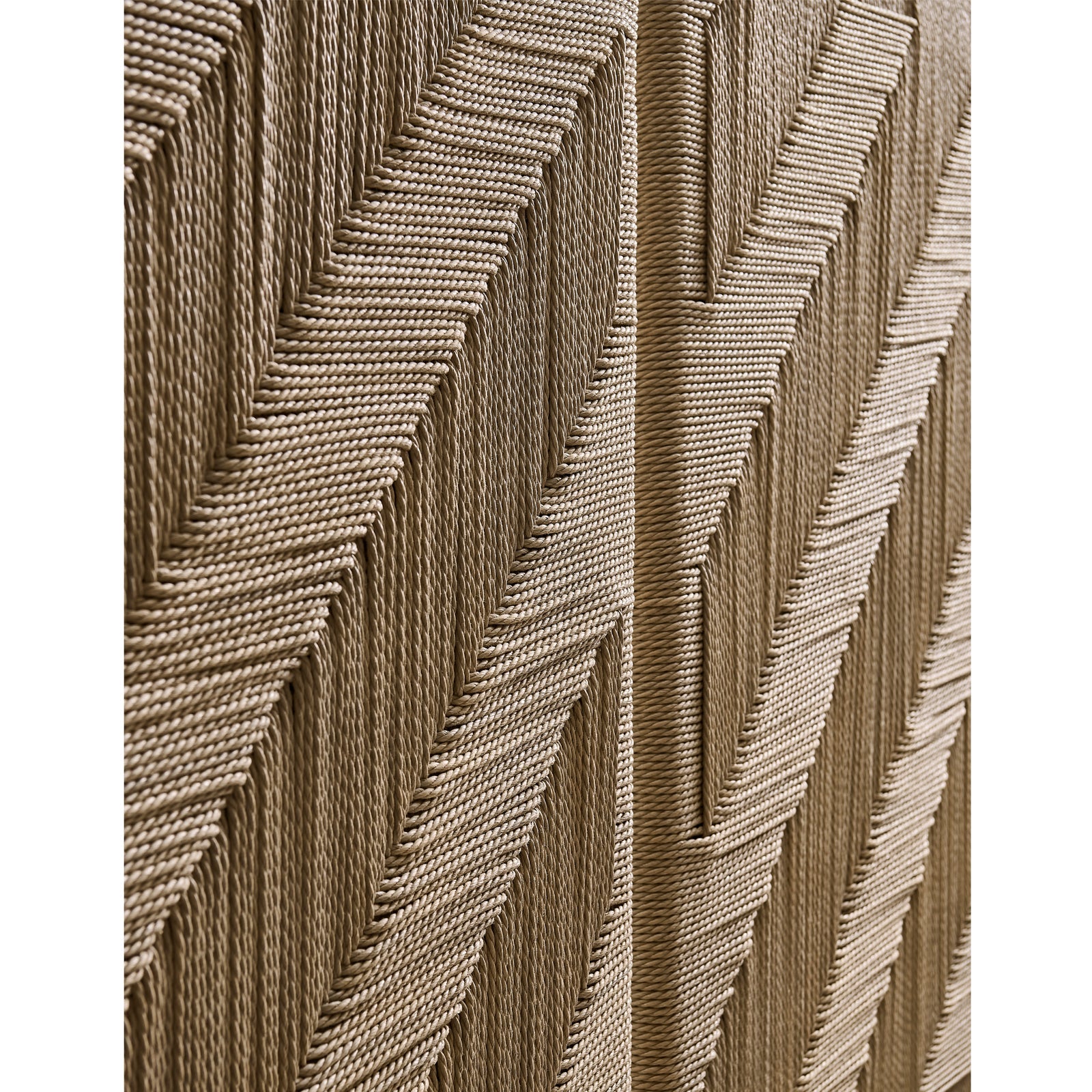 Close-up of natural beige rush weaving texture on Jonathan Charles Sagehill bed headboard chevron pattern