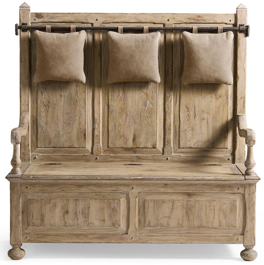 Rustic oak hall bench with three hanging beige velvet pillows and front storage doors