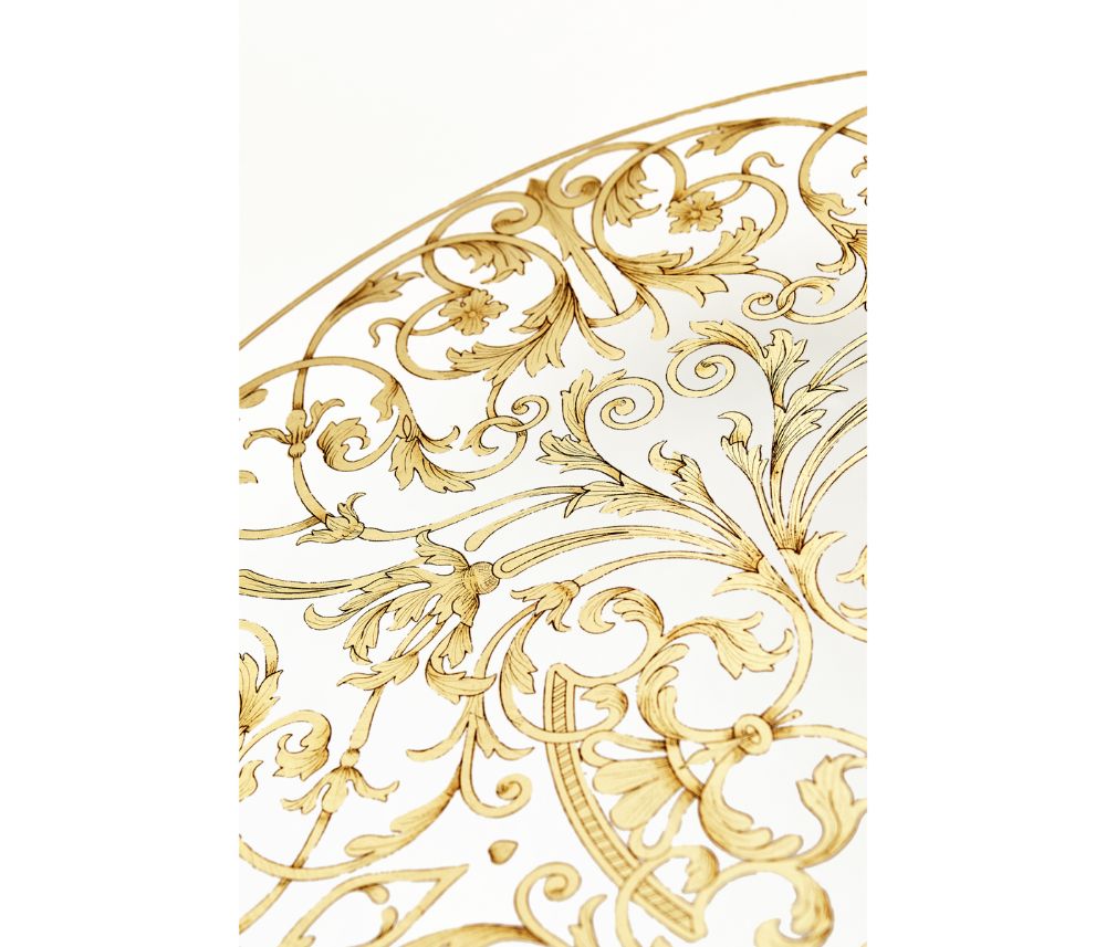 Hand-painted Baroque floral vine motifs in gold leaf on translucent glass surface
