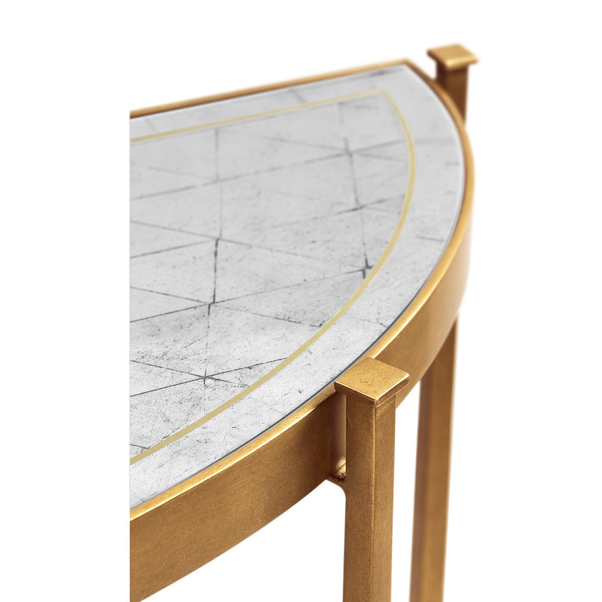 Corner detail of Jonathan Charles demilune console table edge highlighting polished gold metal rim and crackled glass texture