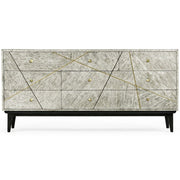 Six-drawer light gray wood grain dresser with symmetrical gold linear inlays and tapered legs
