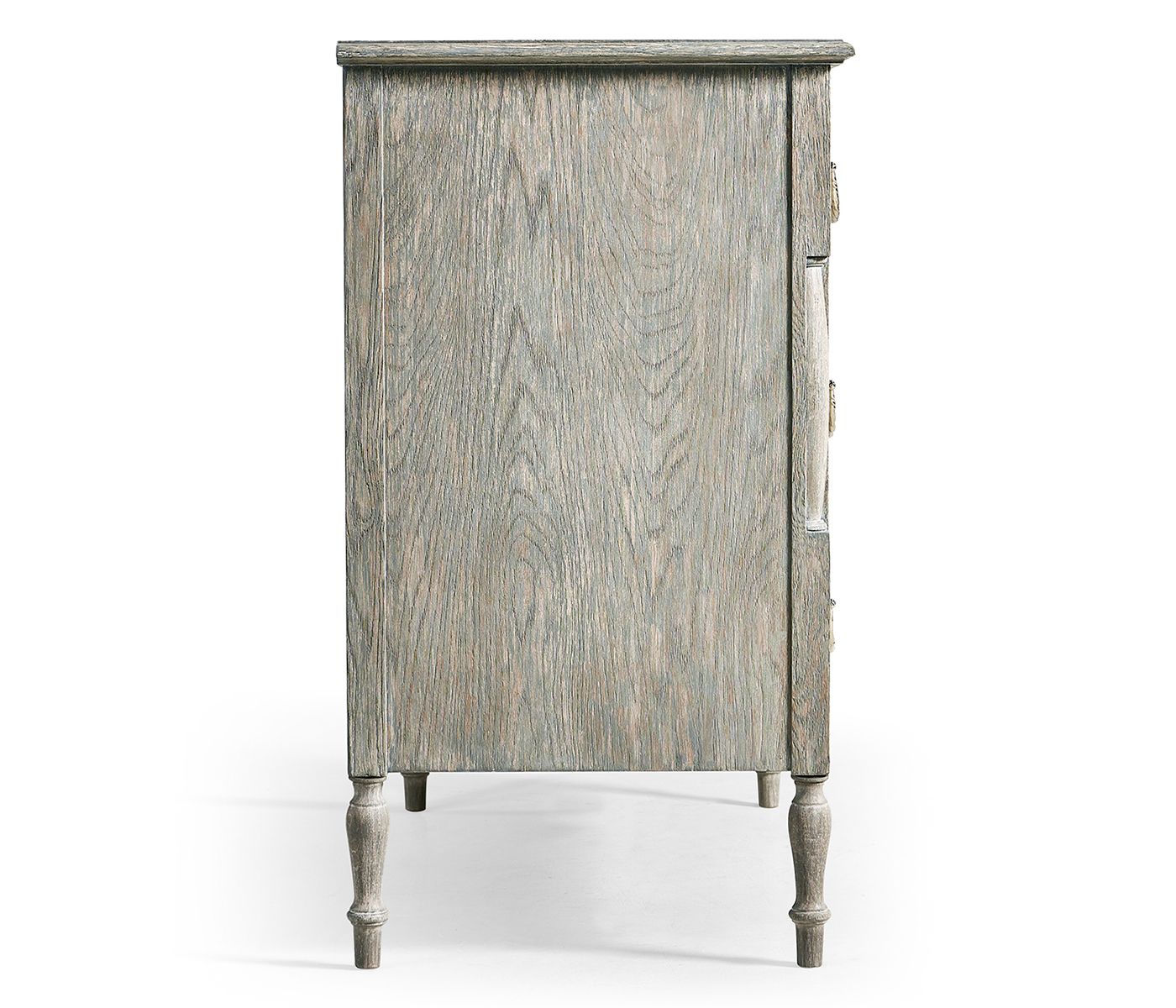 Side profile of Jonathan Charles Morningside chest displaying turned legs and recessed handle slot on distressed gray panel