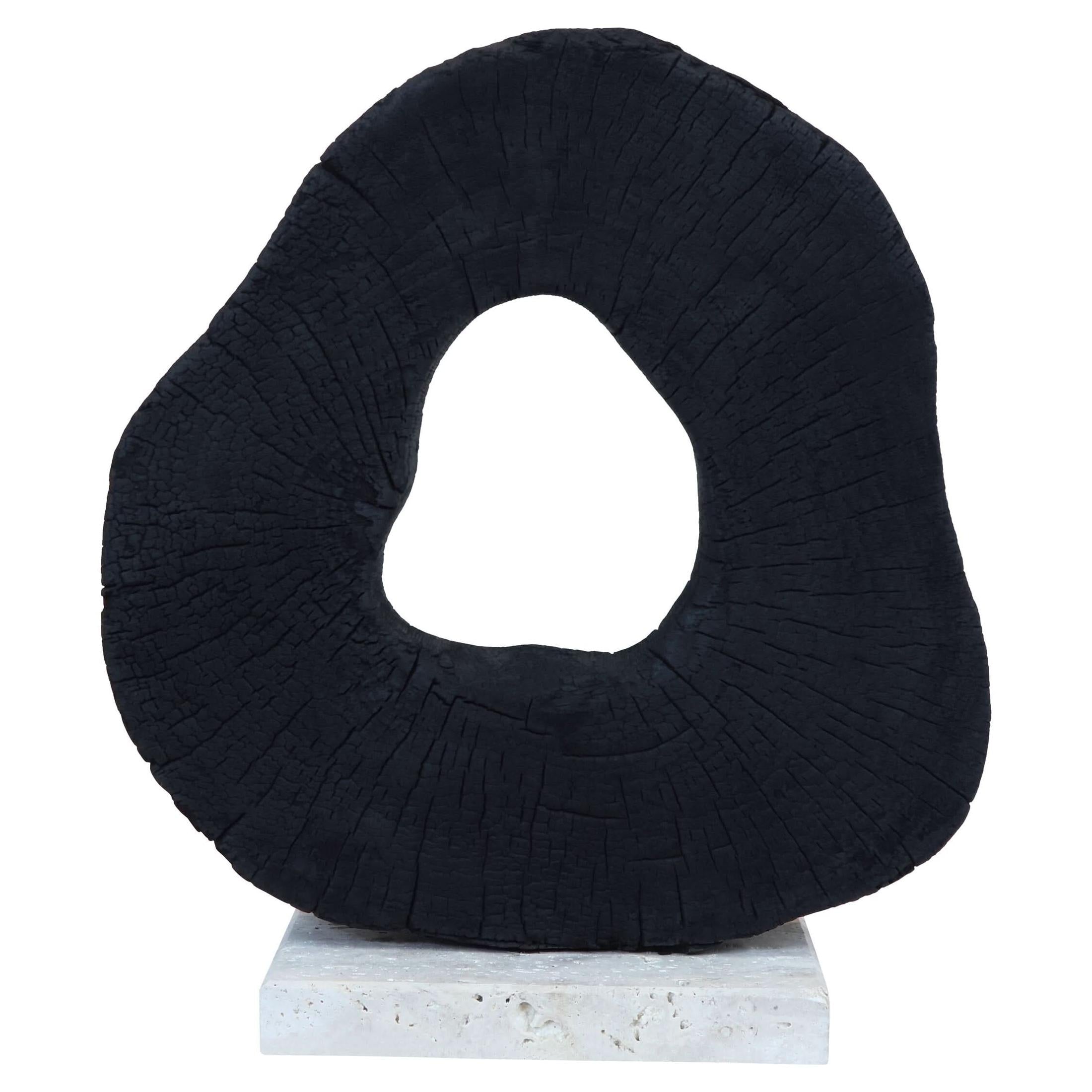 Tibor Black Mango Wood Sculpture with Travertine Base   Nicholas John Interiors
