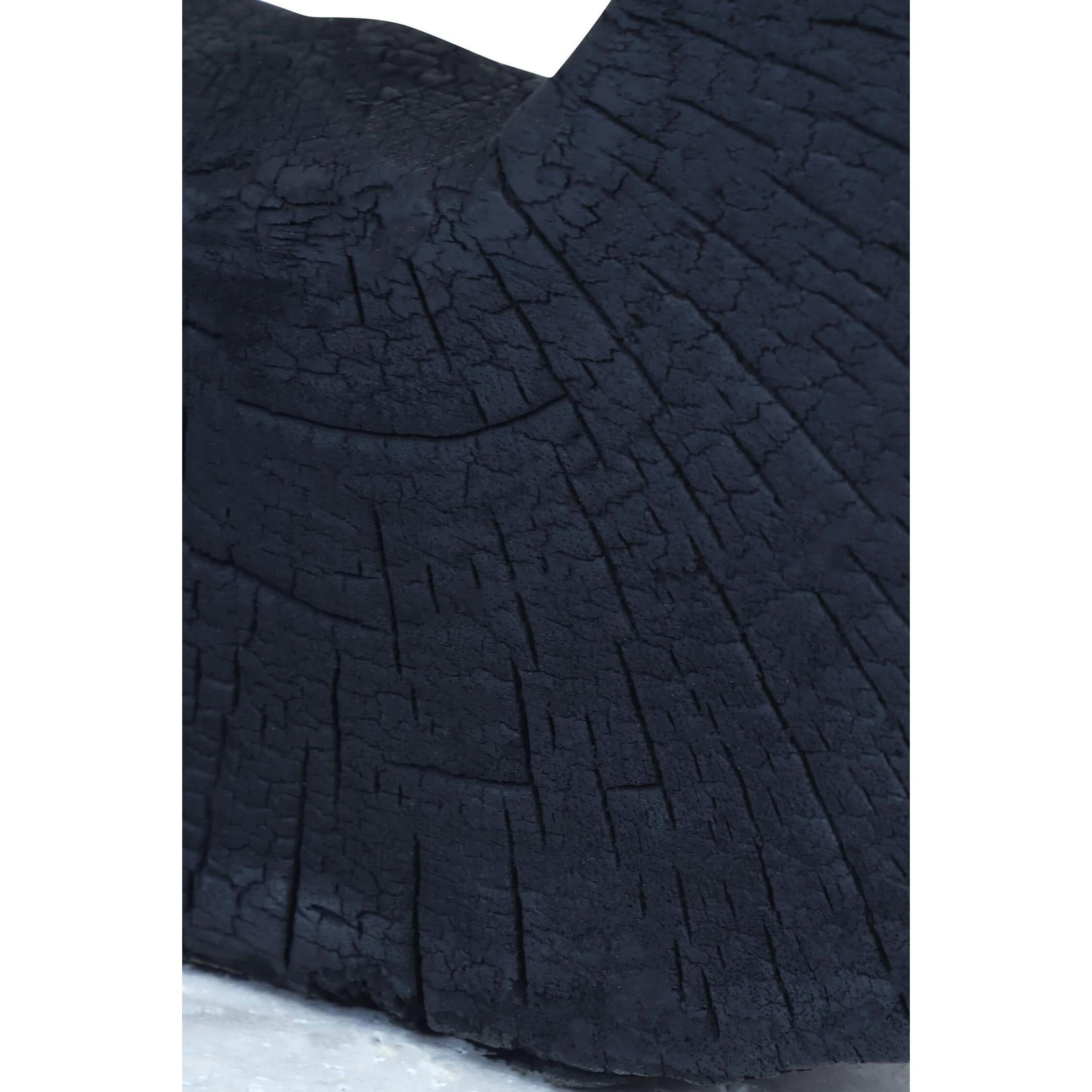 Tibor Black Mango Wood Sculpture with Travertine Base   Nicholas John Interiors
