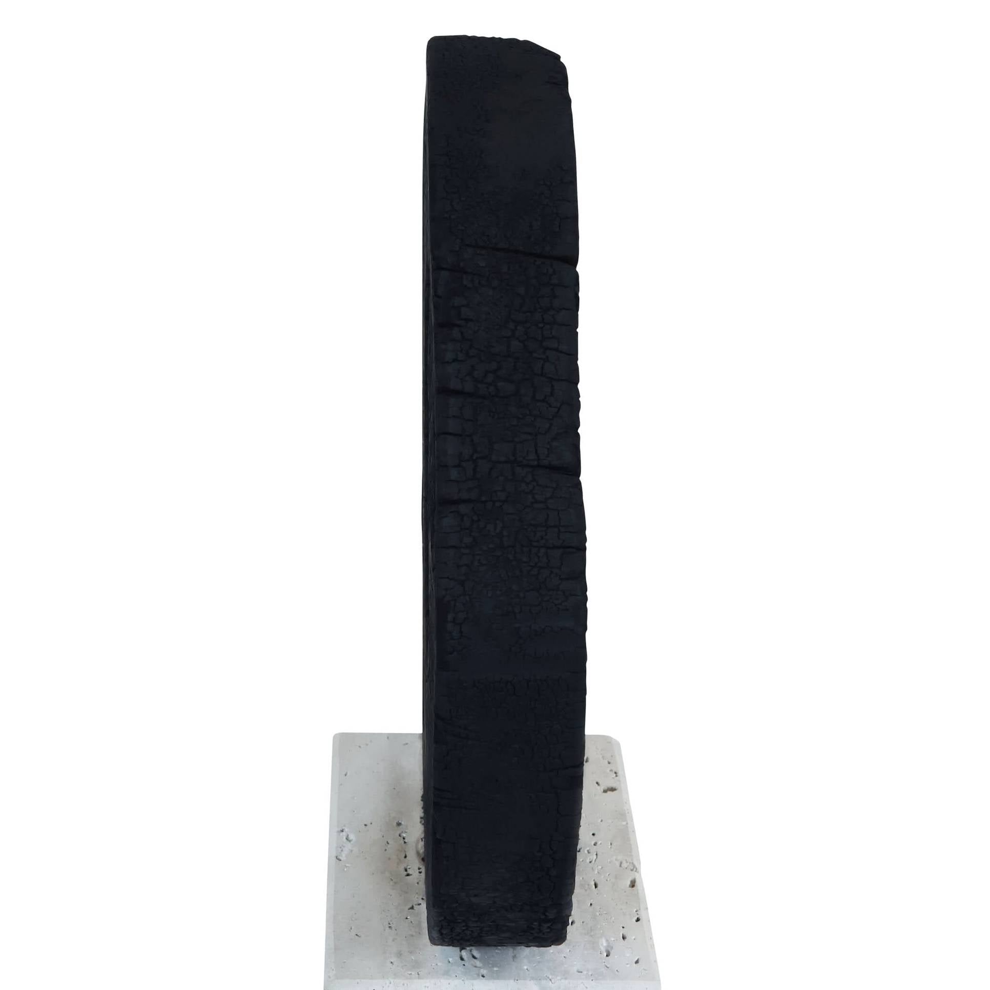 Tibor Black Mango Wood Sculpture with Travertine Base   Nicholas John Interiors