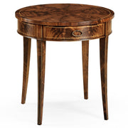Round antique mahogany side table with gold trim and tapered legs