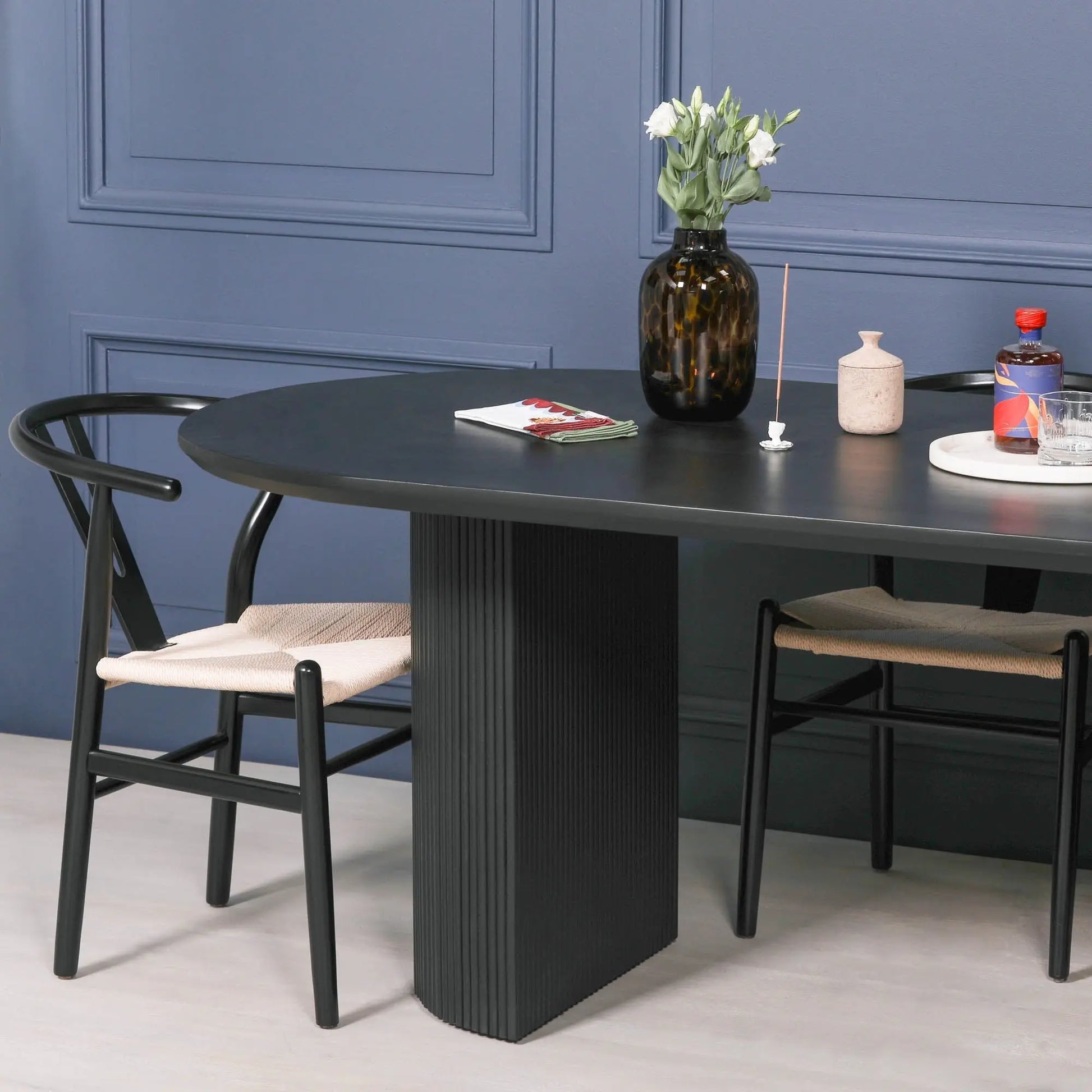 Black Painted Acacia Fluted Oval Dining Table   Nicholas John Interiors