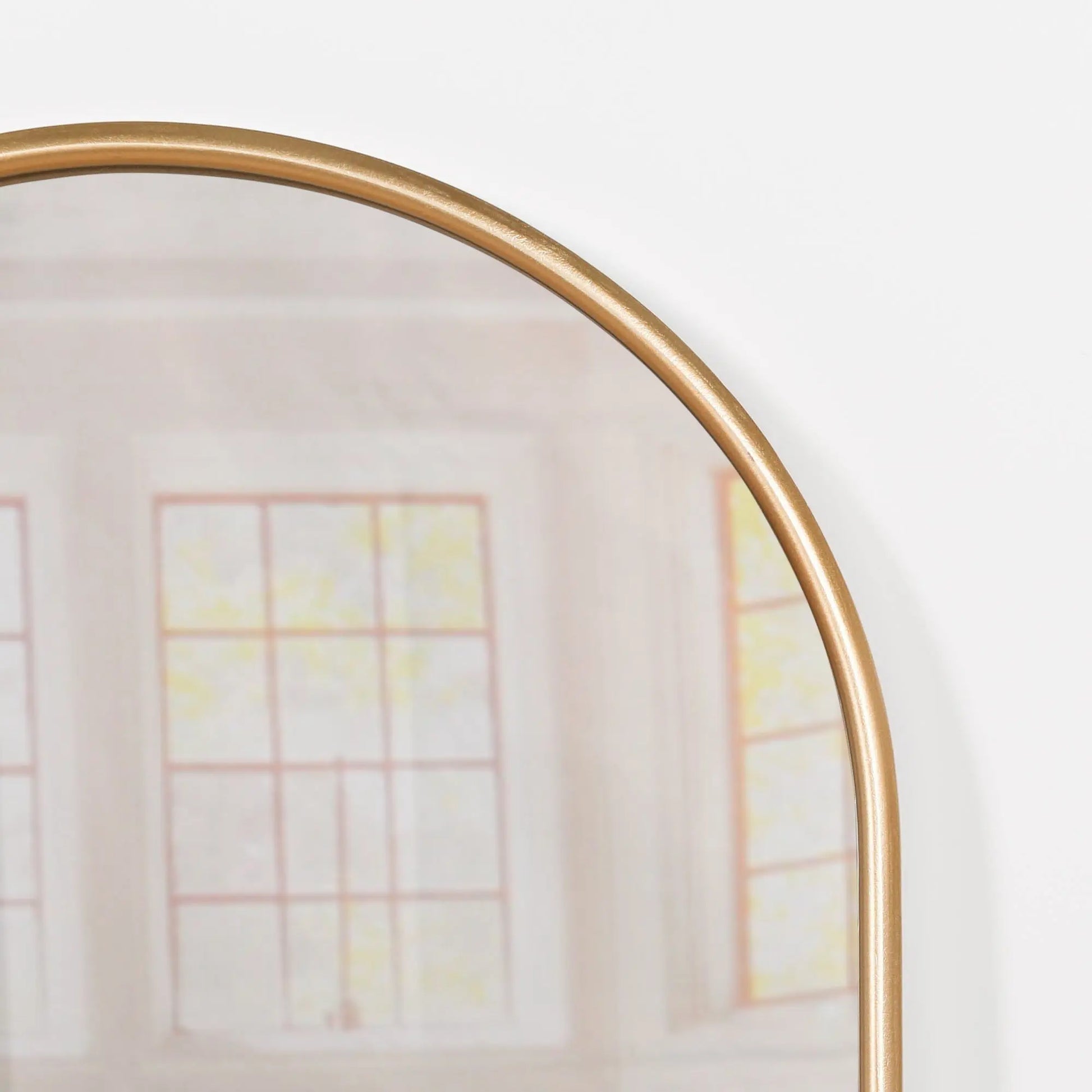 Gold Curved Arched Metal Wall Mirror   Nicholas John Interiors