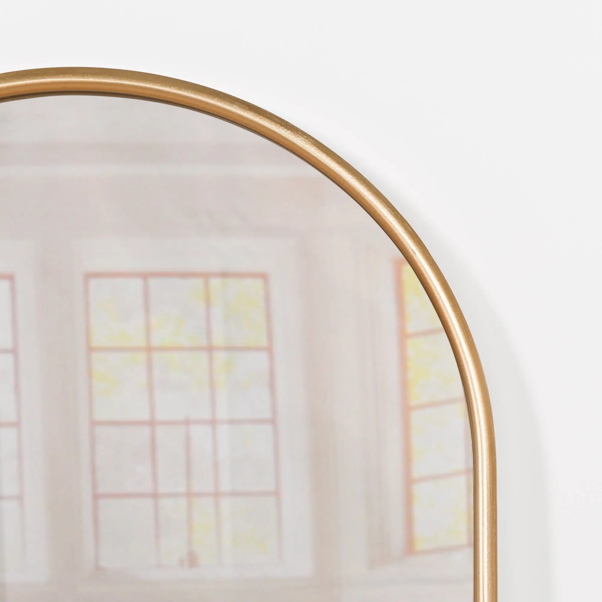 Gold Curved Arched Metal Wall Mirror   Nicholas John Interiors