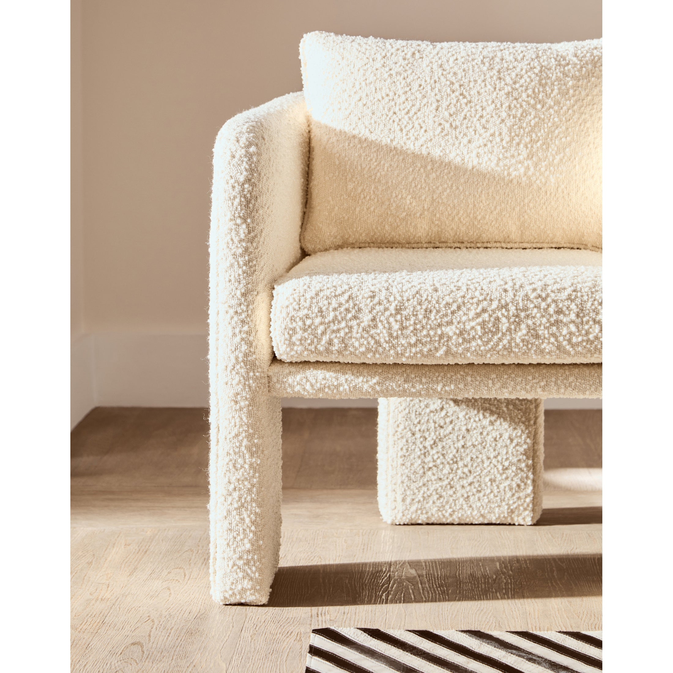 Mazzero Ivory Boucle Curved Armchair  Nicholas John Interiors