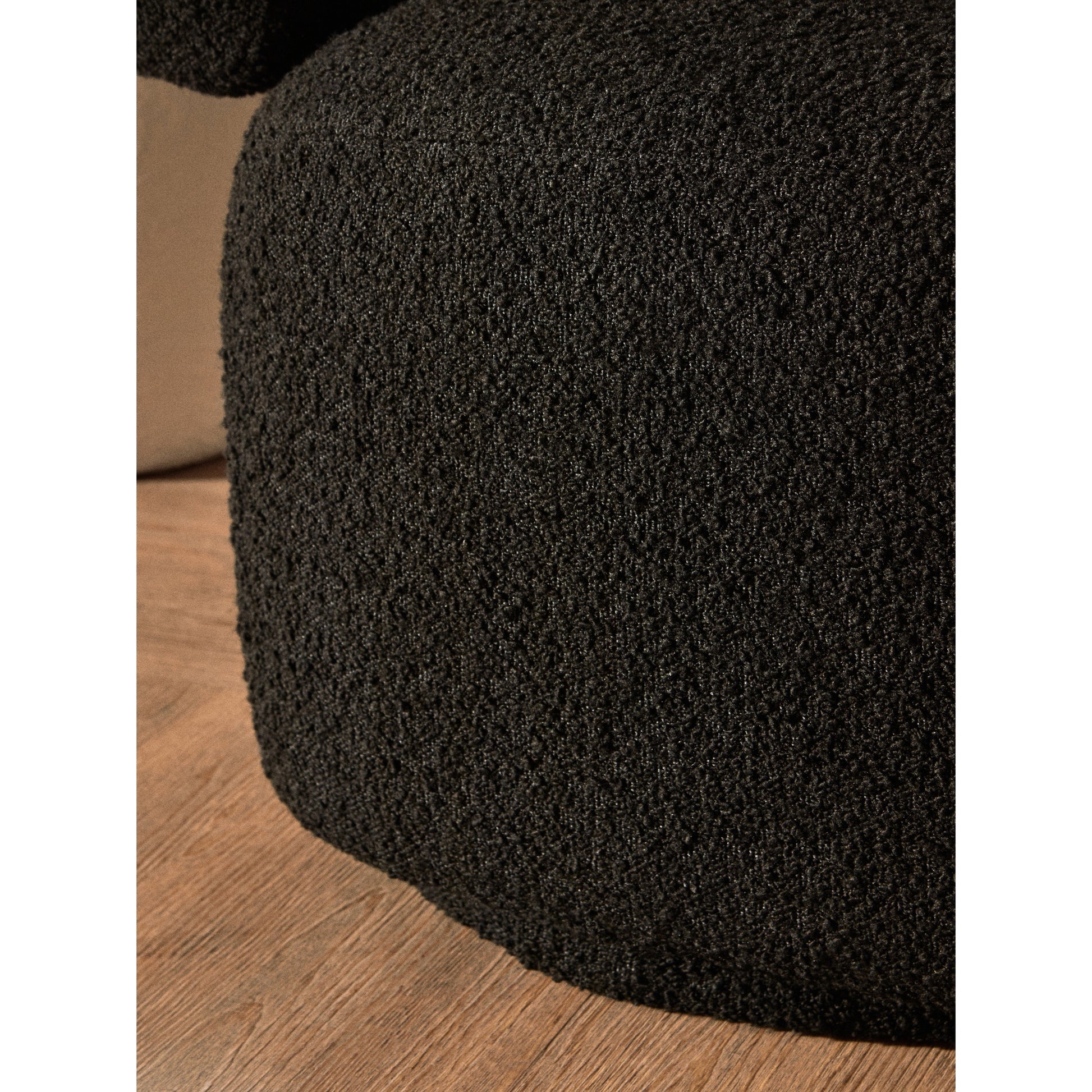 Olivra Black Boucle Curved Revolving Armchair  Nicholas John Interiors