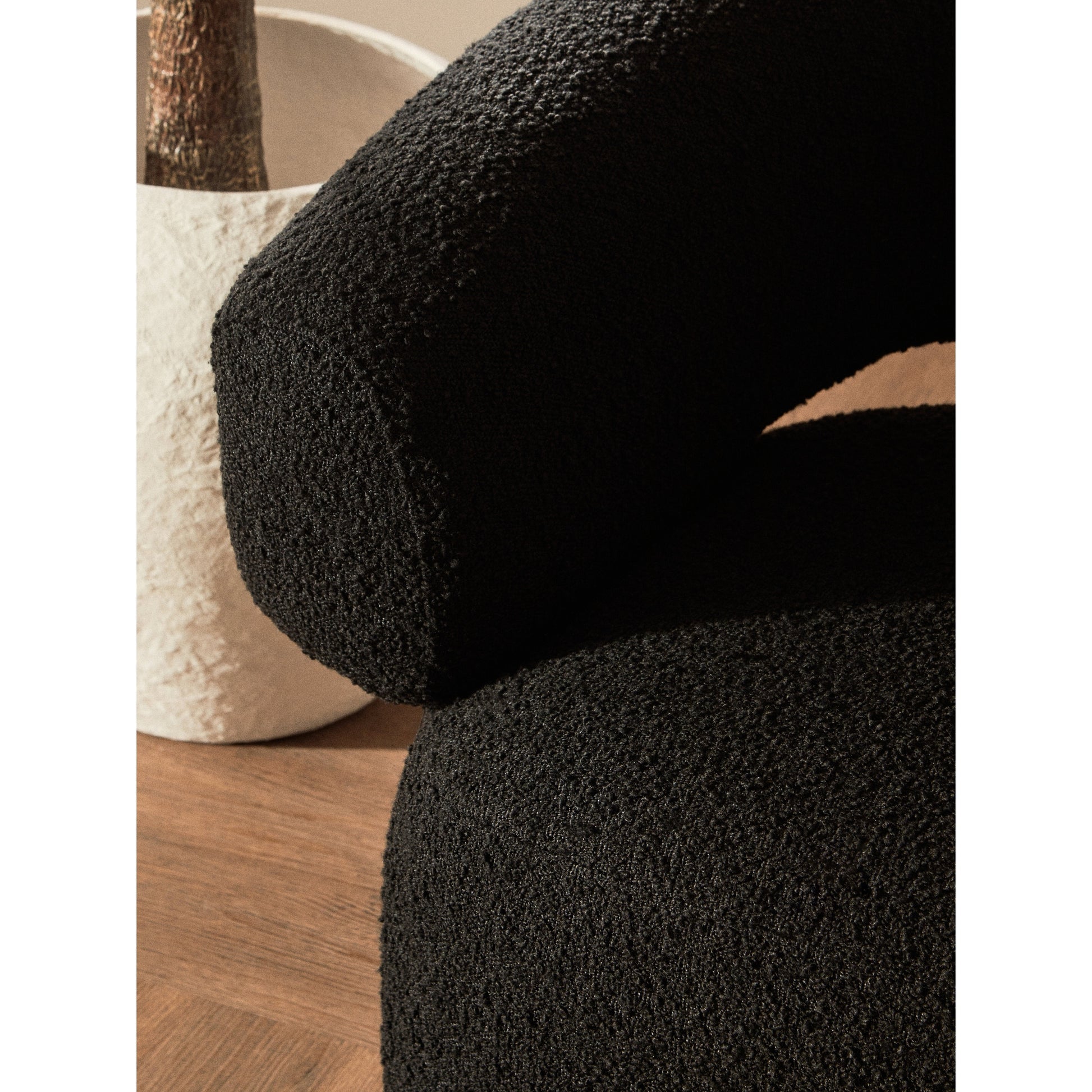 Olivra Black Boucle Curved Revolving Armchair  Nicholas John Interiors