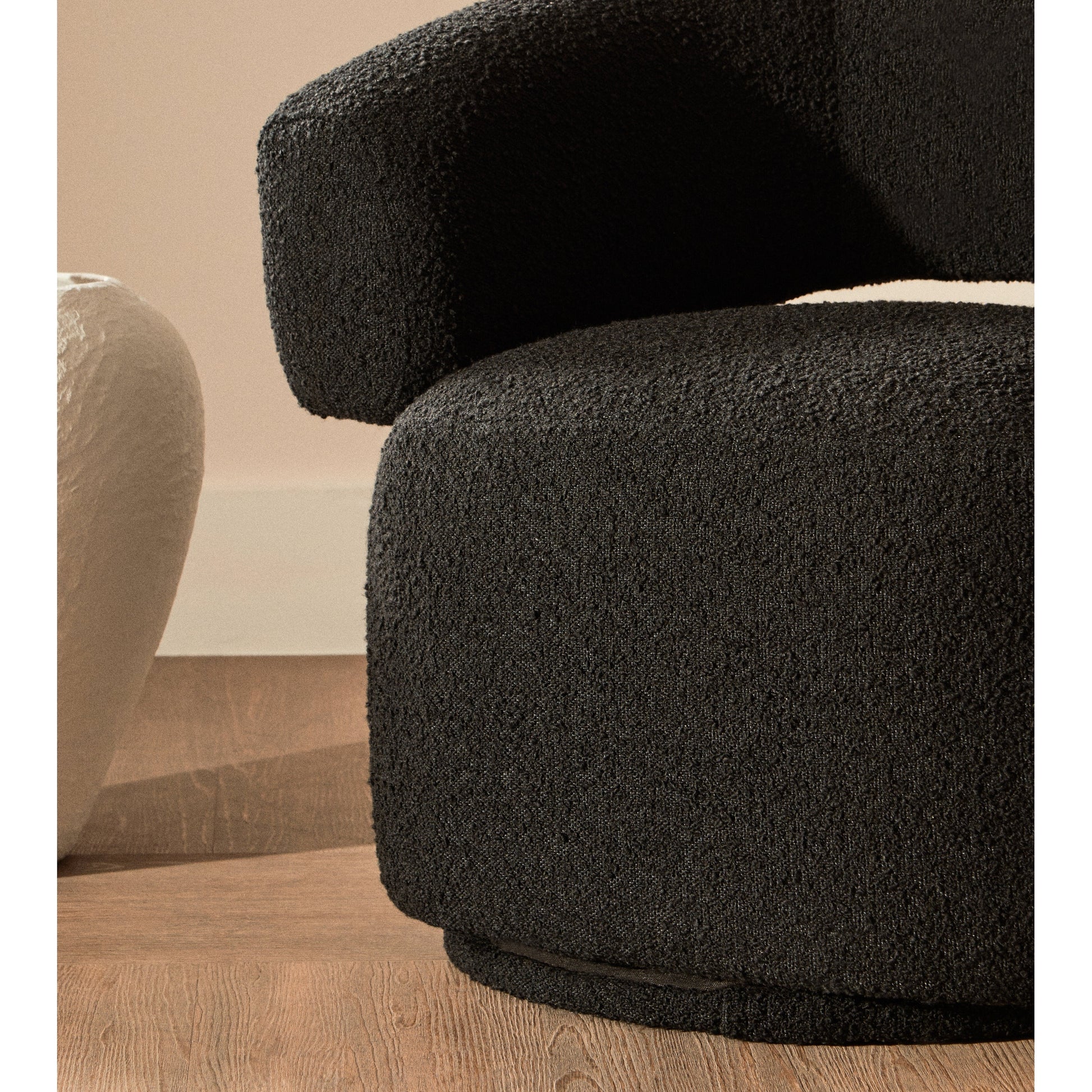 Olivra Black Boucle Curved Revolving Armchair  Nicholas John Interiors