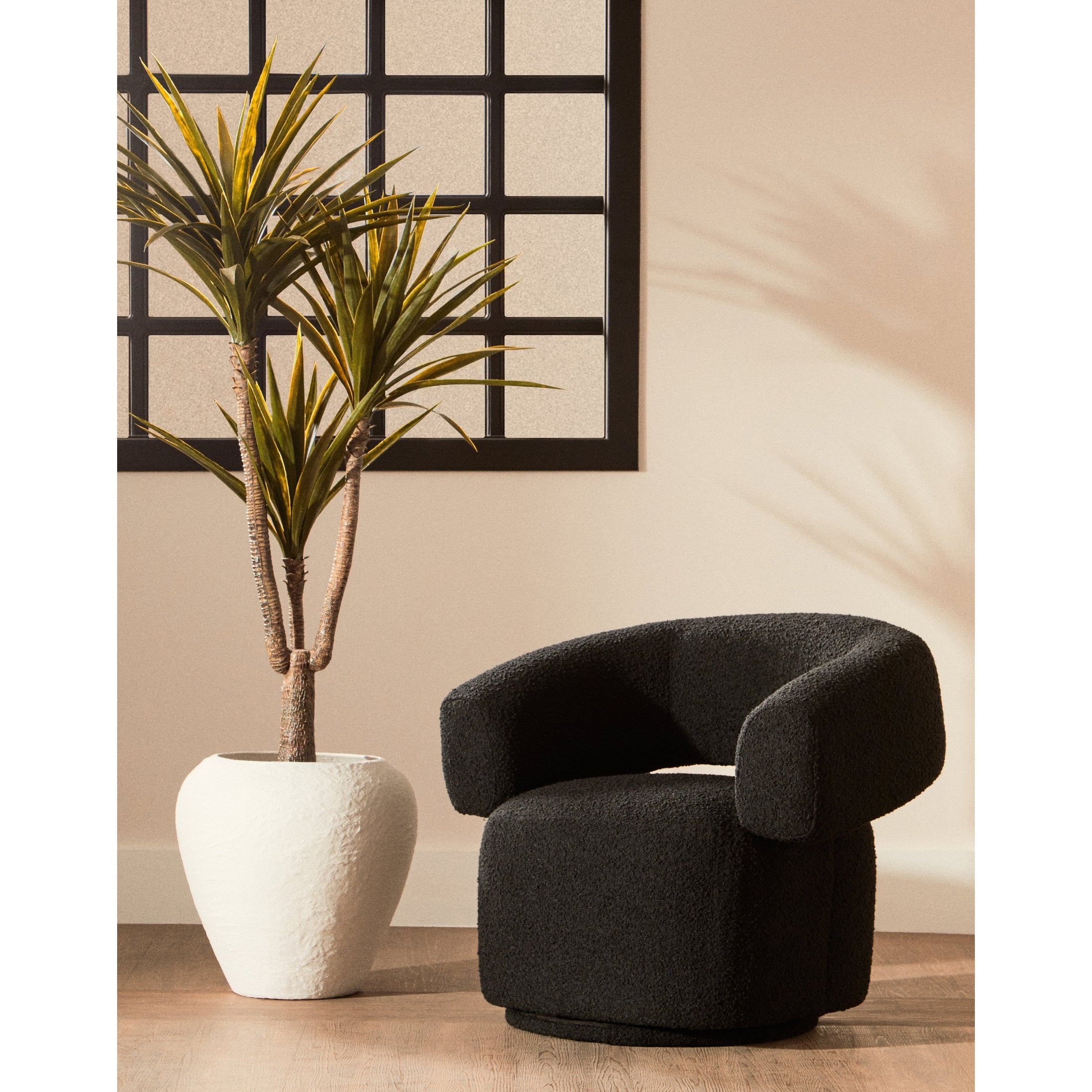 Olivra Black Boucle Curved Revolving Armchair  Nicholas John Interiors