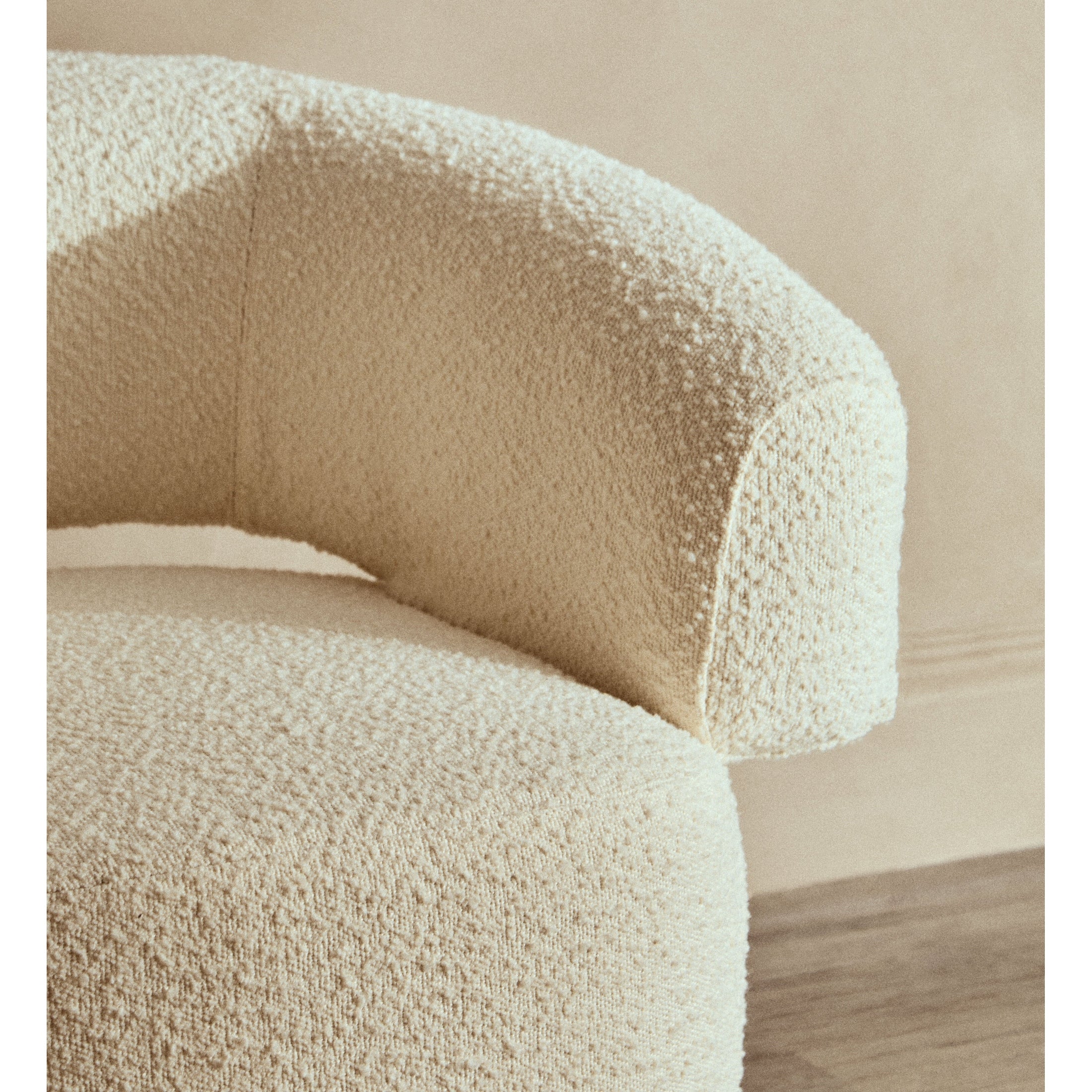 Olivra Ivory Boucle Curved Revolving Armchair  Nicholas John Interiors