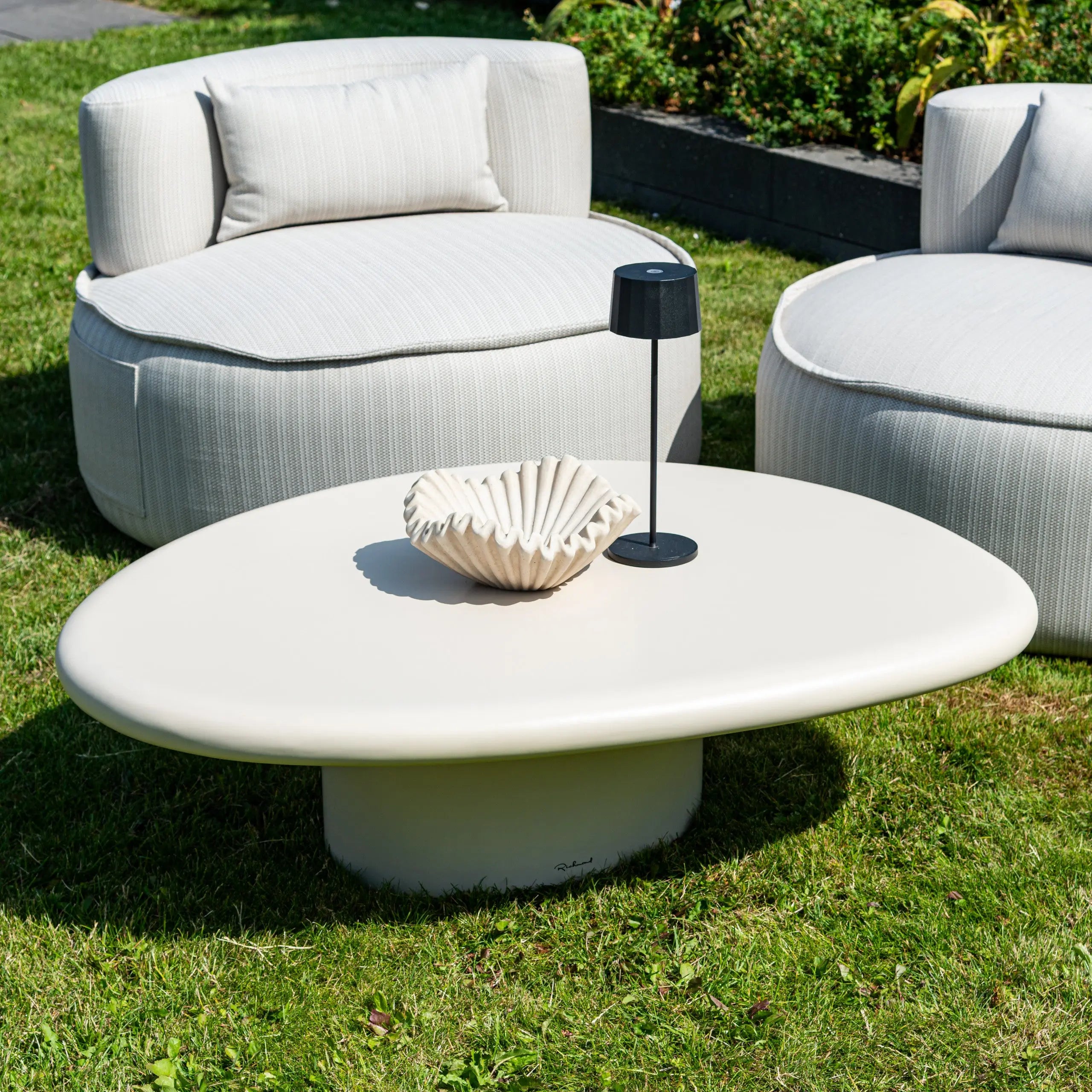Outdoor coffee table Urban Bloom sandstone   Nicholas John Interiors