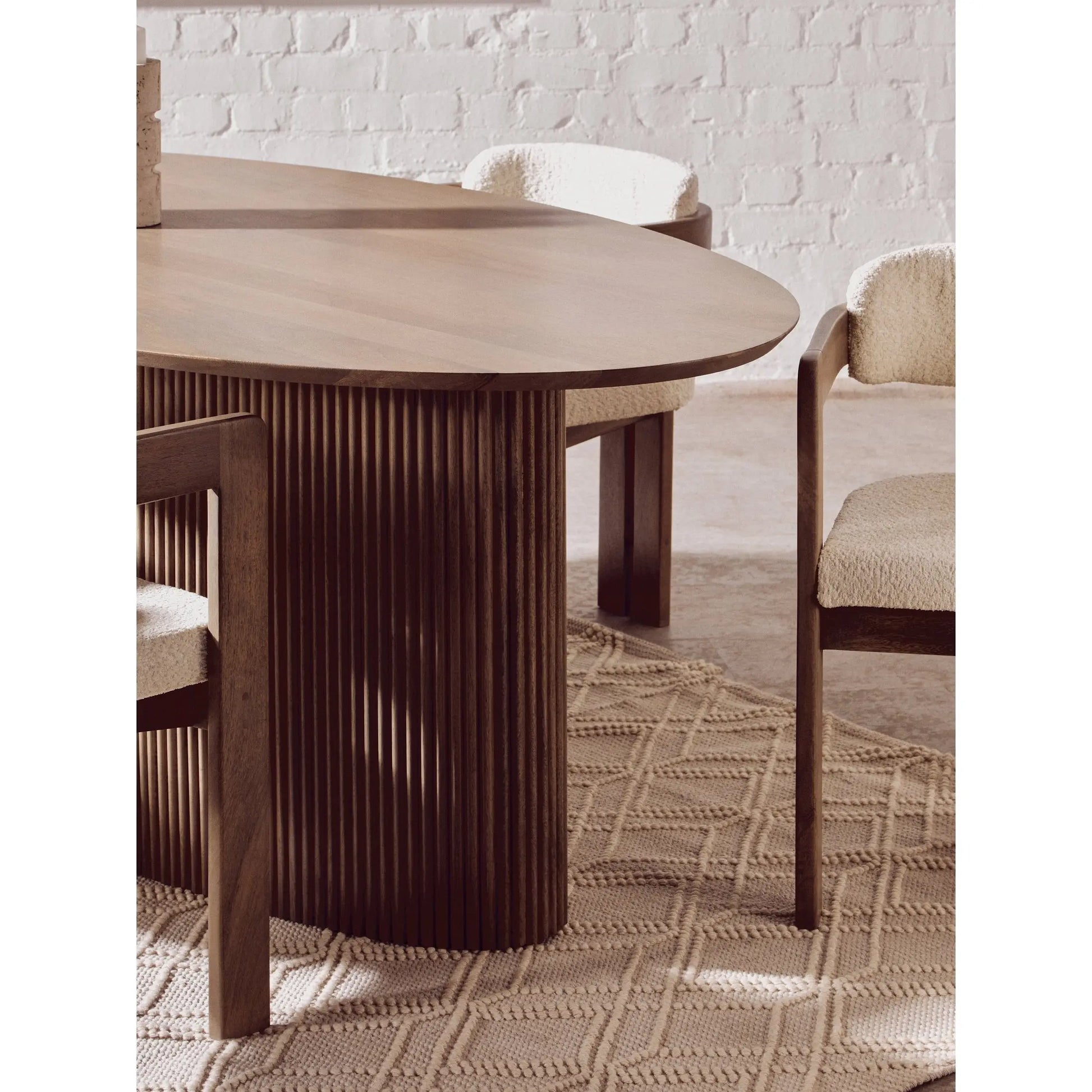 Varello Grey Mango Wood Oval Dining Table with Ridge Base  Nicholas John Interiors
