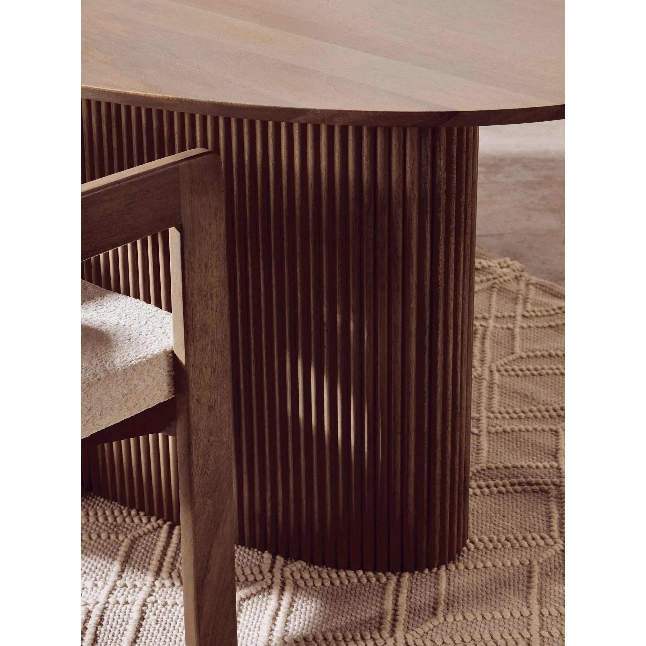 Varello Grey Mango Wood Oval Dining Table with Ridge Base  Nicholas John Interiors