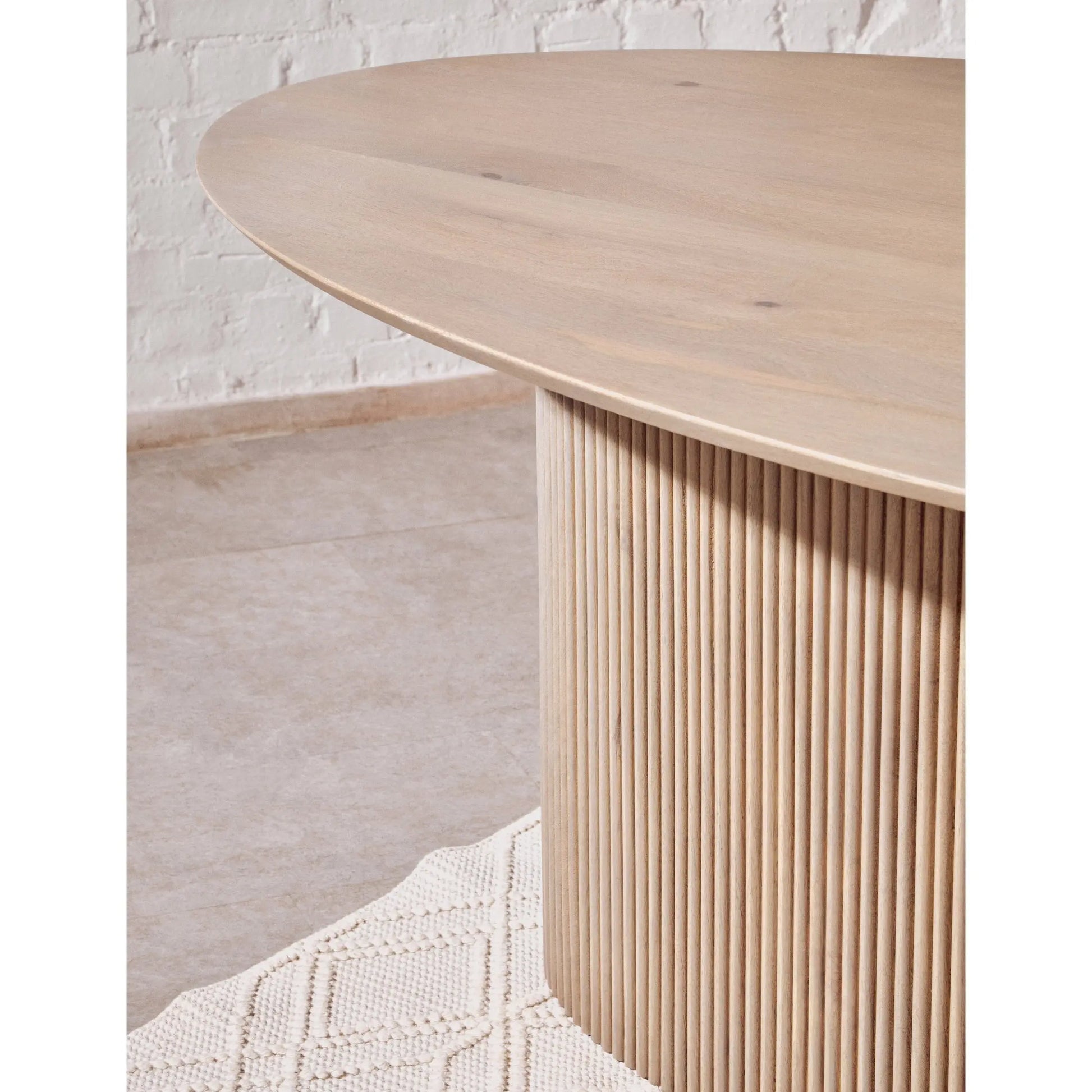 Varello Grey Mango Wood Oval Dining Table with Ridge Base  Nicholas John Interiors