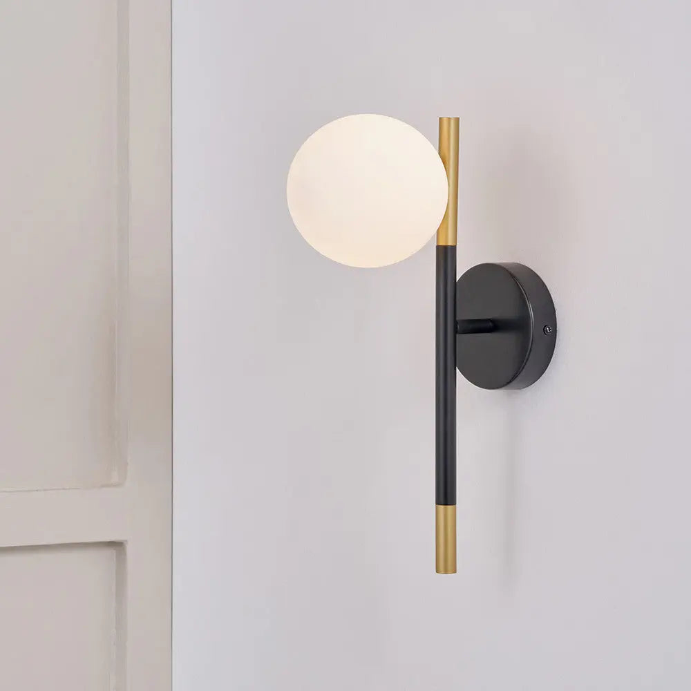Wanda White Orb & Black Metal Wall Light  Nicholas John Interiors
