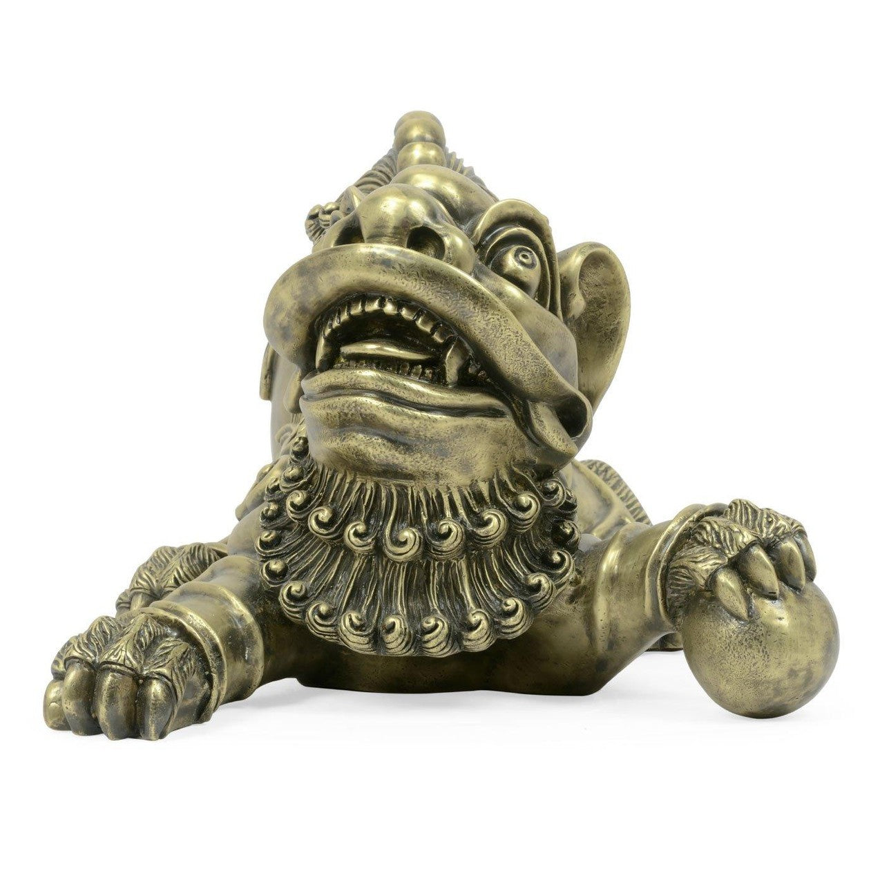 Close-up antique brass Foo Dog face with detailed teeth, tongue, and weathered metallic finish
