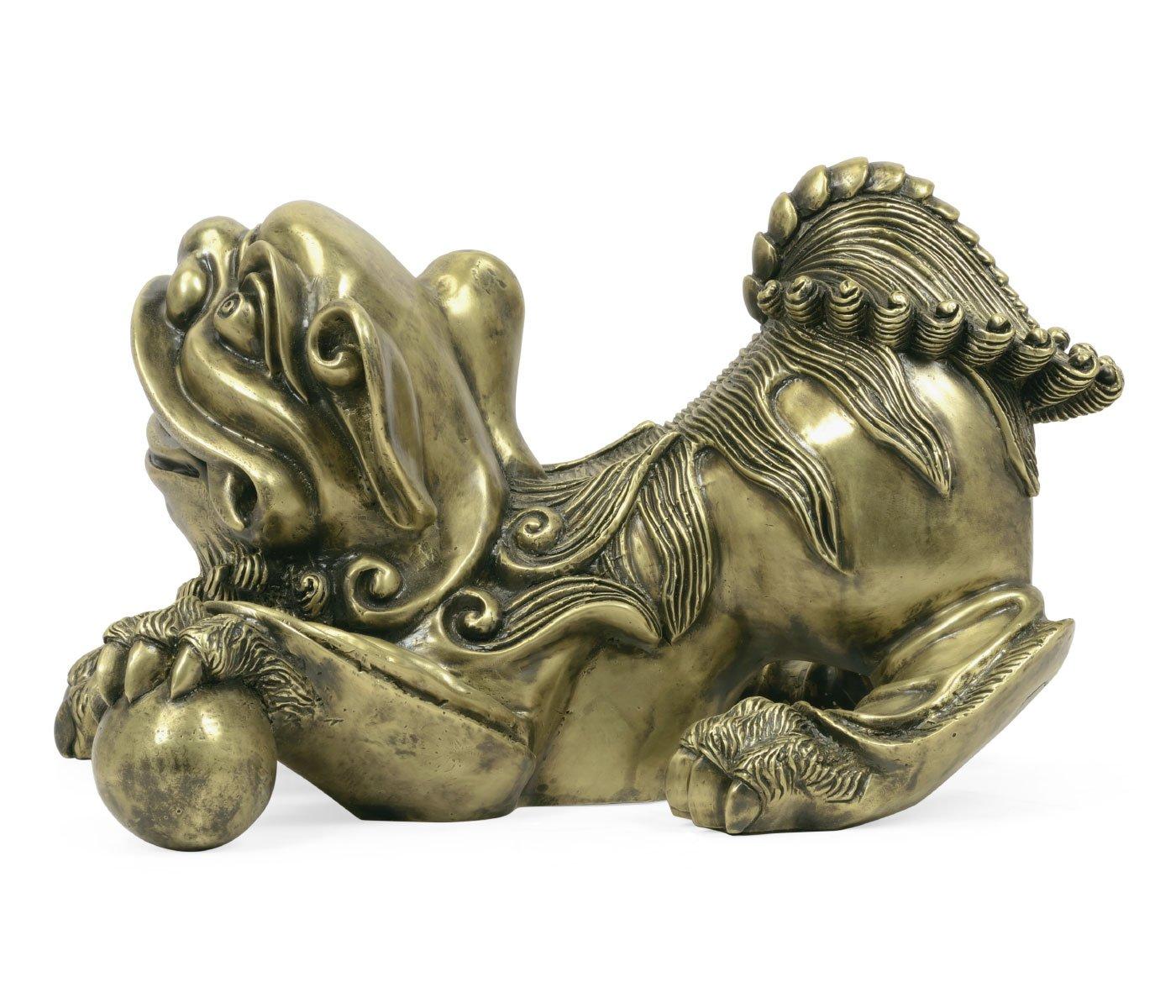Side profile antique brass Foo Dog crouching pose with stylized mane and visible claw details