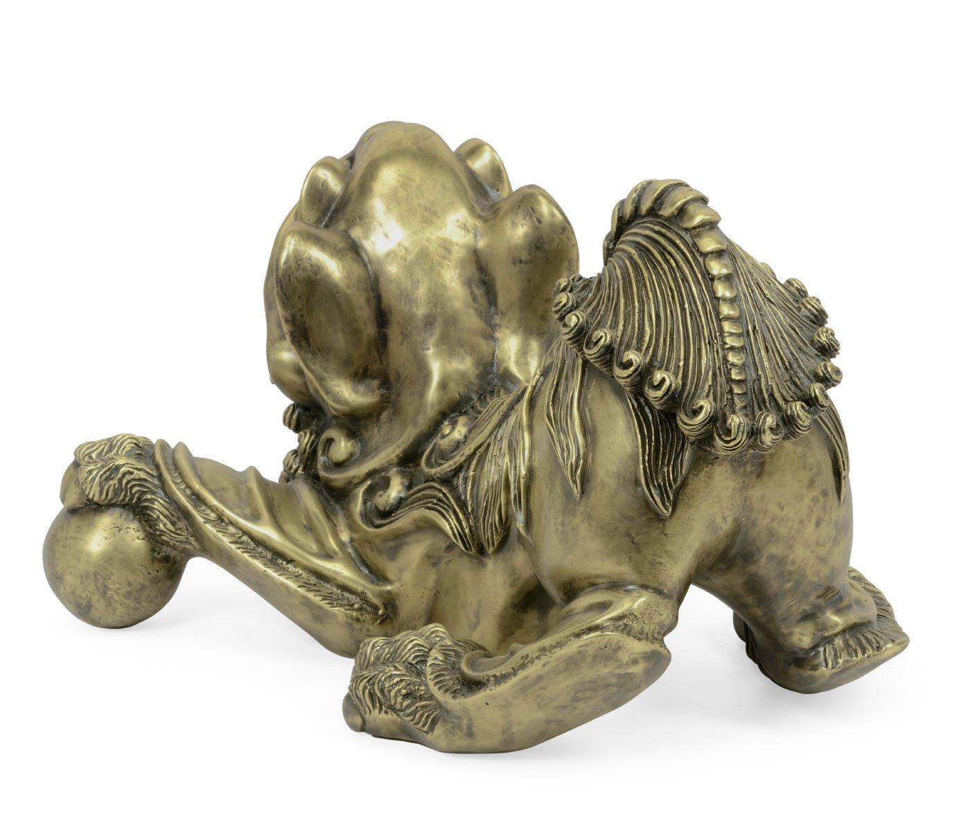 Antique brass Foo Dog ornament rear-left view showing carved mane, textured paw pads, and ball detail