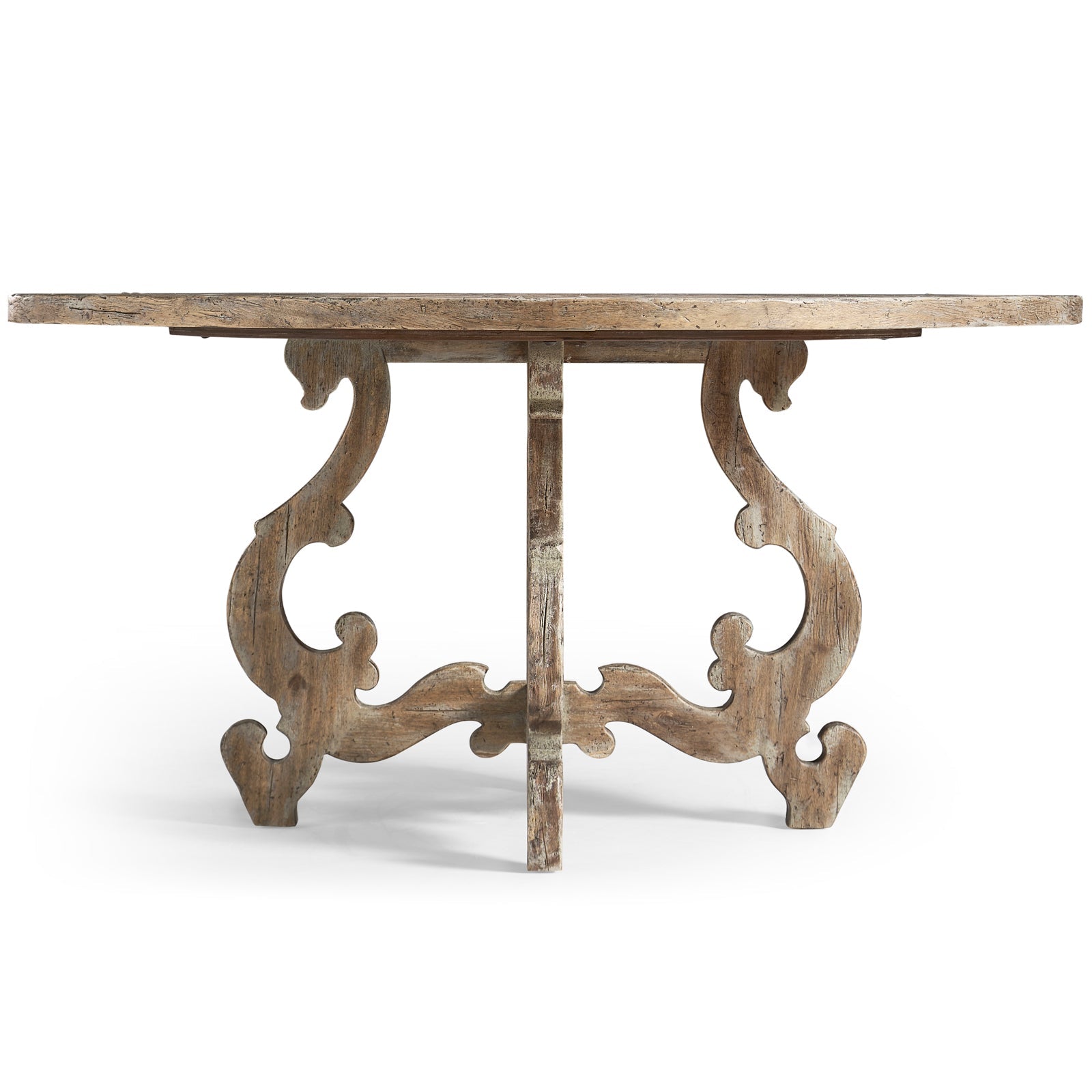 Low-angle rear view of Jonathan Charles round dining table underside featuring sculptural carved side legs and stretcher
