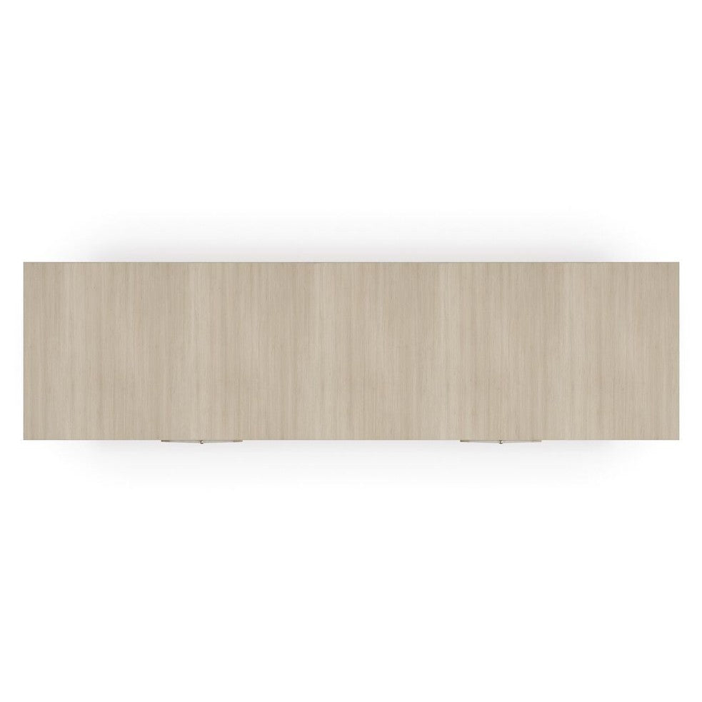 Top-down view of Caracole Hang Up dresser top surface in light ash wood grain with centered metallic pulls
