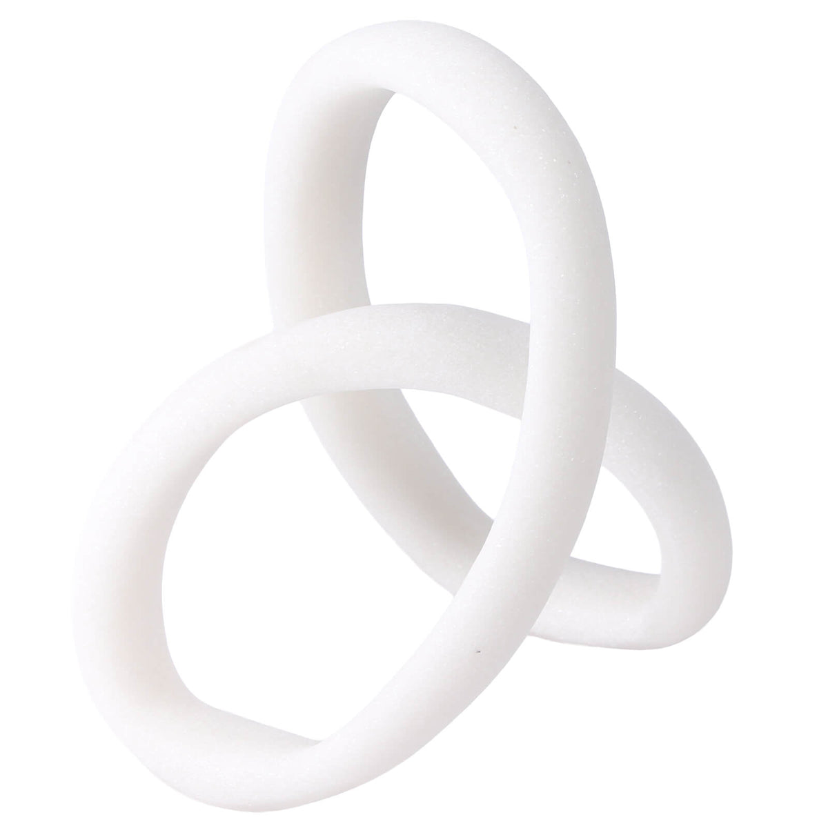 Rear-three-quarter view of white resin geometric form highlighting organic curvature and balance