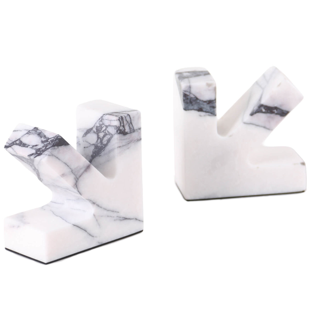 Three-Quarter Angle of Polished Marble Bookends Showing Pinkish Tones