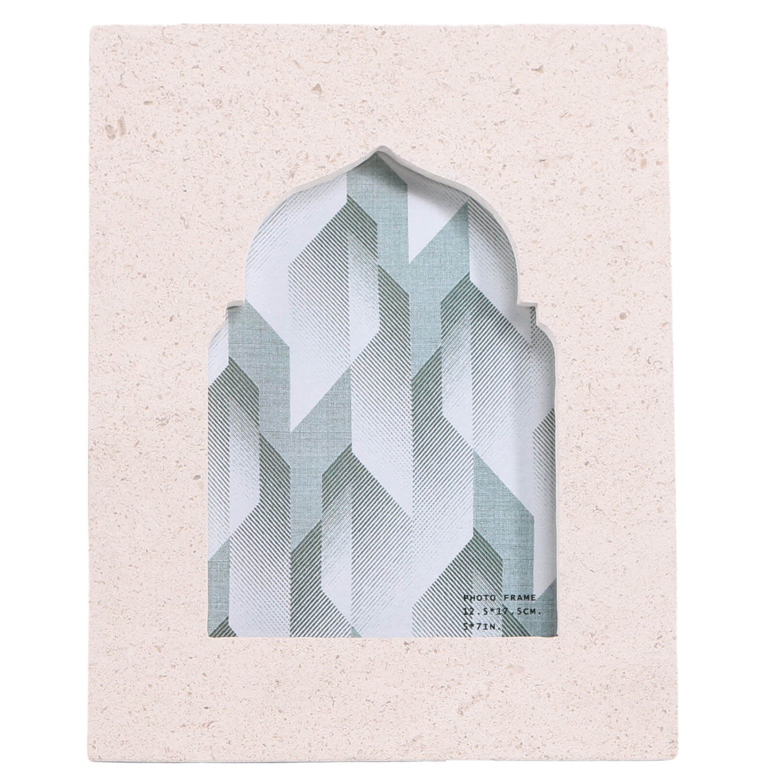 Front view of arched sandstone frame with layered teal insert