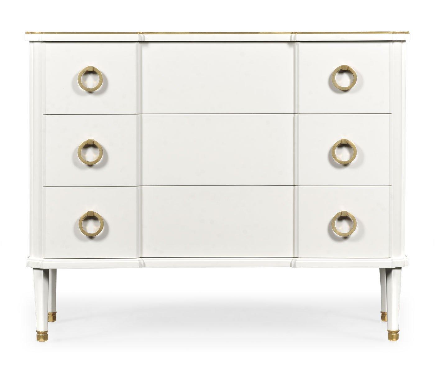 Jonathan Charles three-drawer chest in painted ivory with six brass ring pulls and top trim