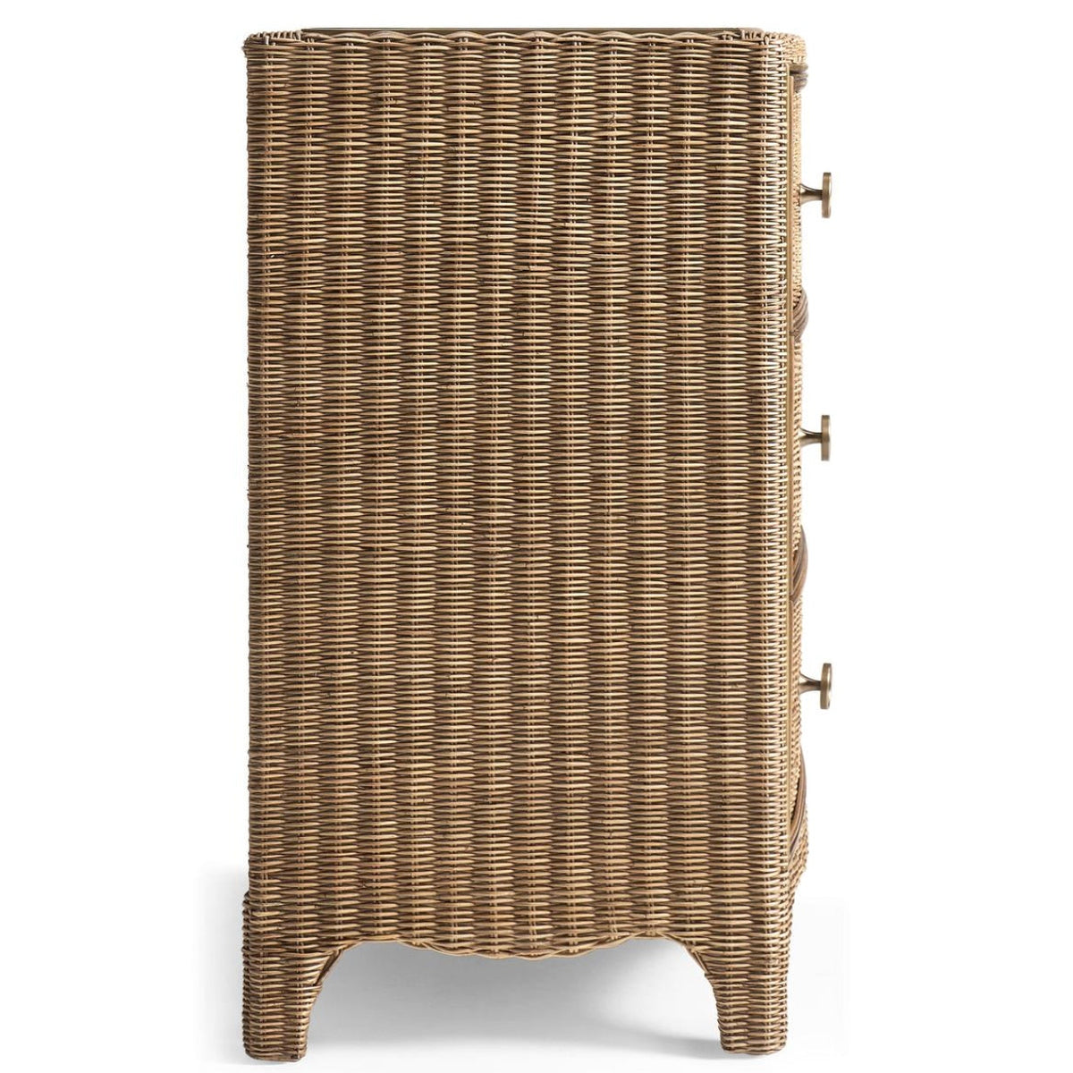 Side profile of tapered leg rattan dresser highlighting continuous vertical woven texture and brass pulls