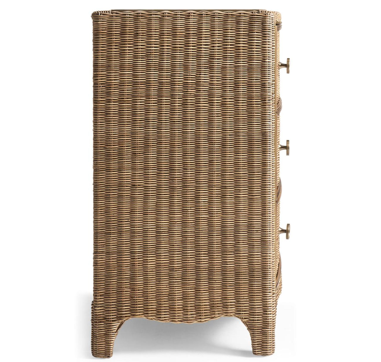 Side profile of tapered leg rattan dresser highlighting continuous vertical woven texture and brass pulls