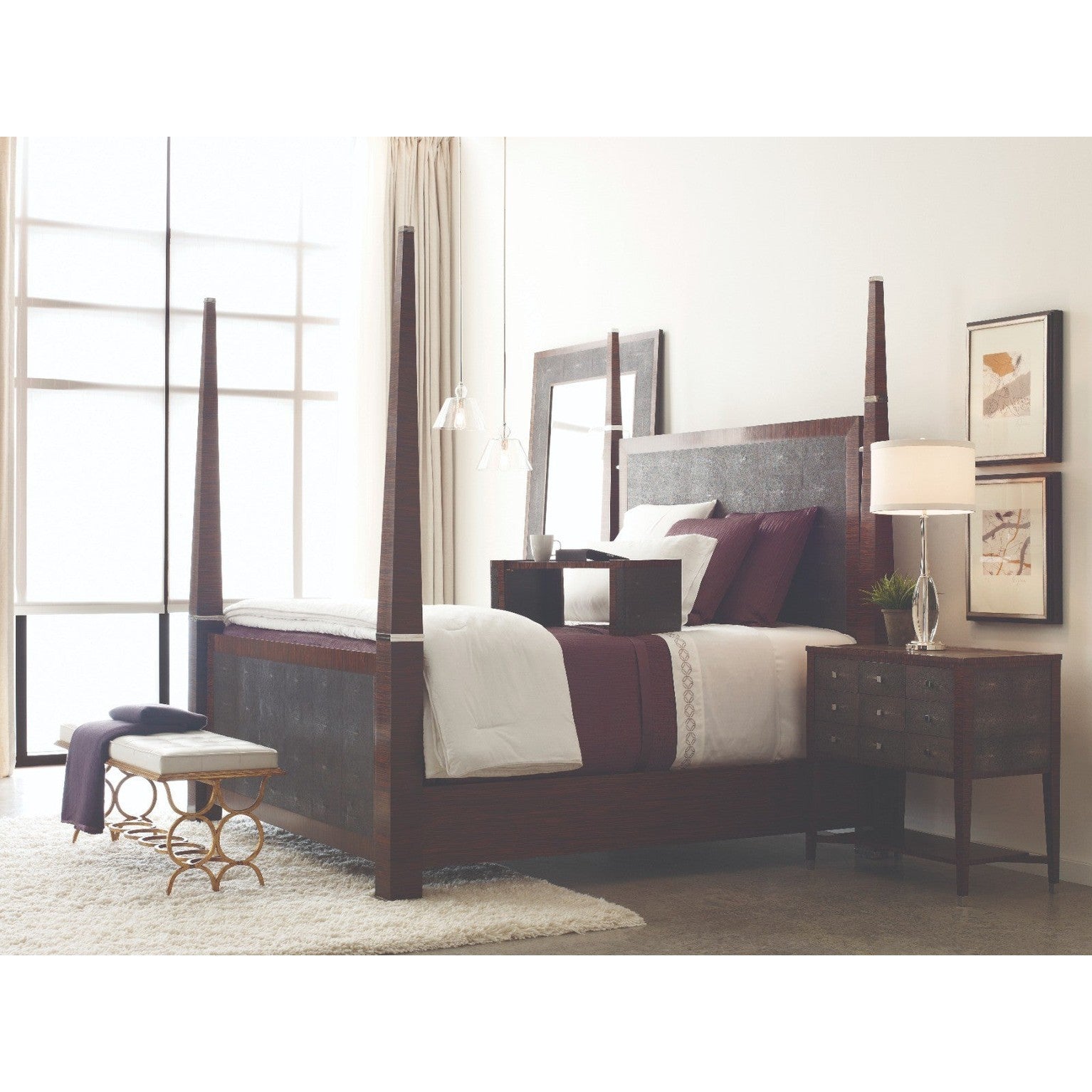 Jonathan Charles Circles Bench with cream tufted leather seat and gilded iron circular legs in bedroom setting