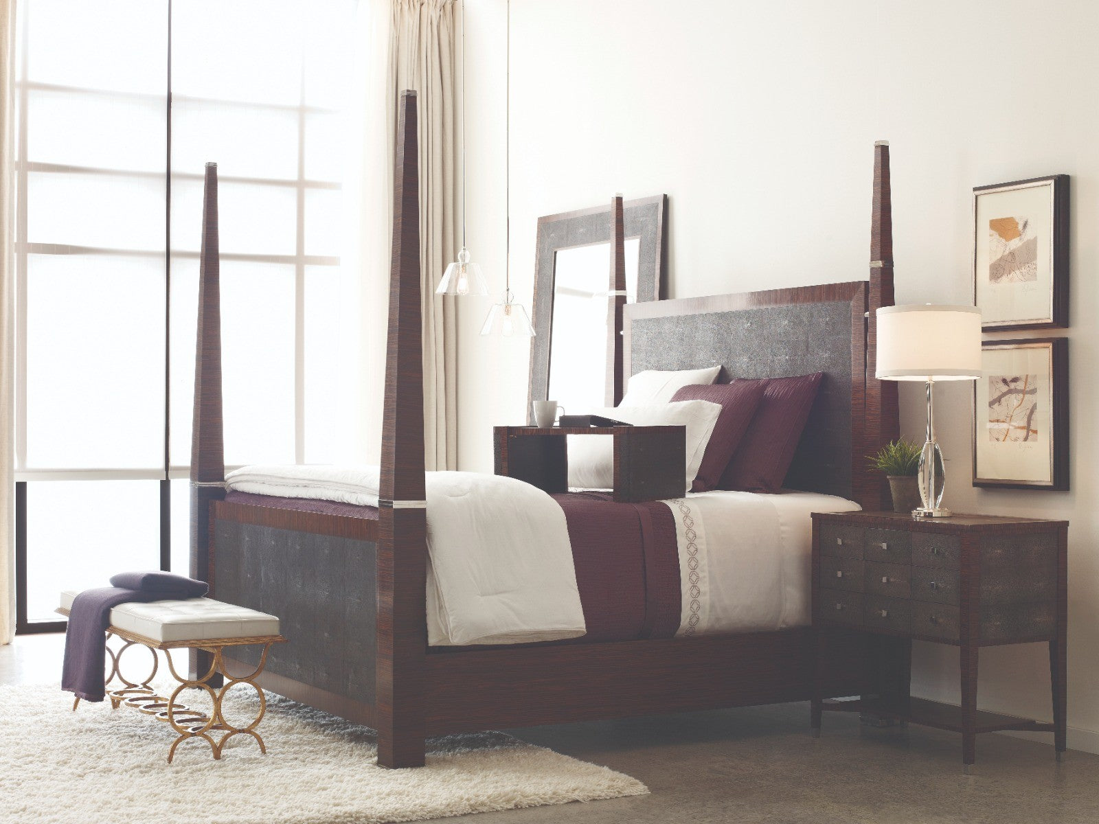 Jonathan Charles Circles Bench with cream tufted leather seat and gilded iron circular legs in bedroom setting